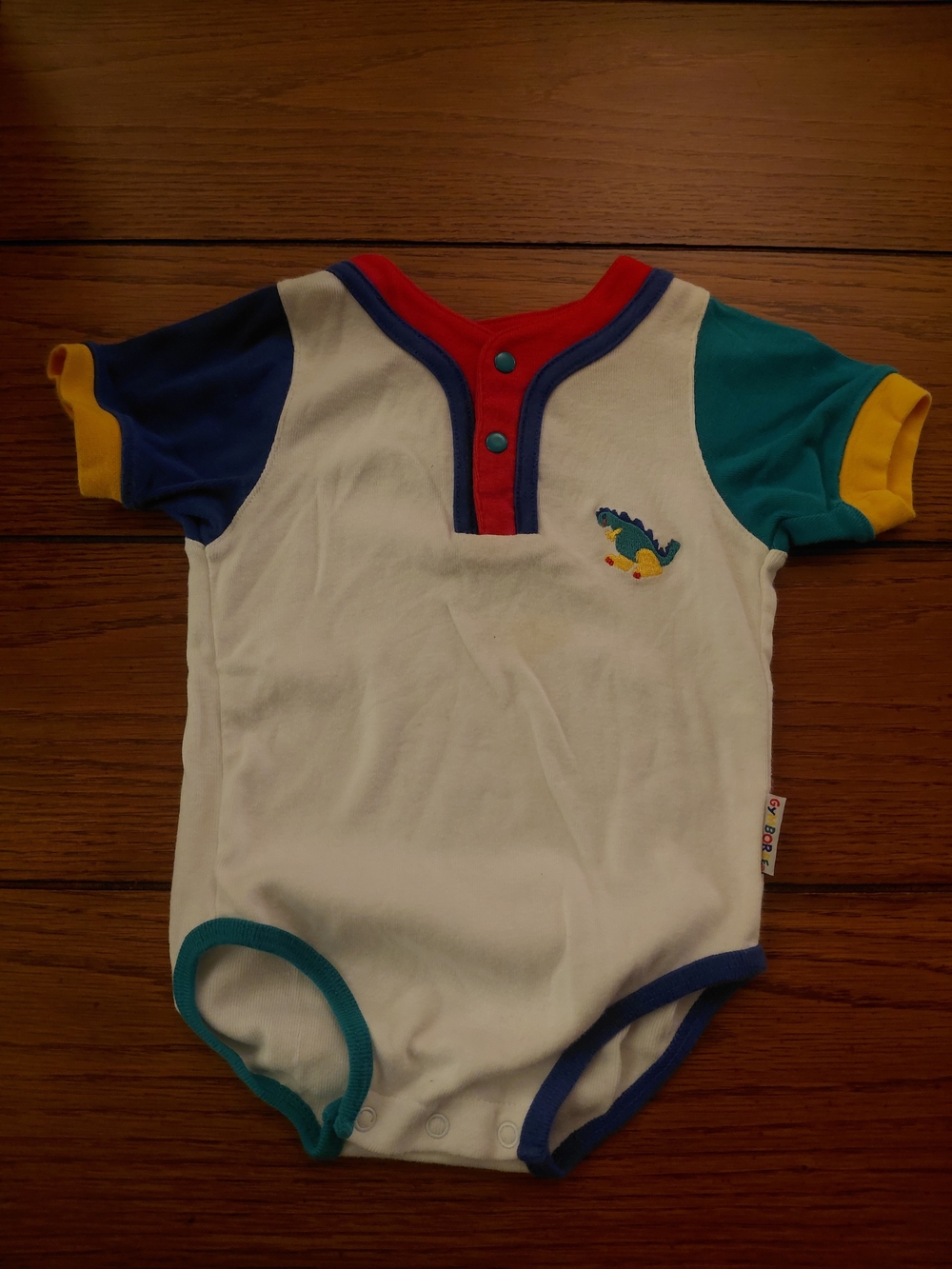 Gymboree White One-Piece with Colorblock Trim and Dino Patch